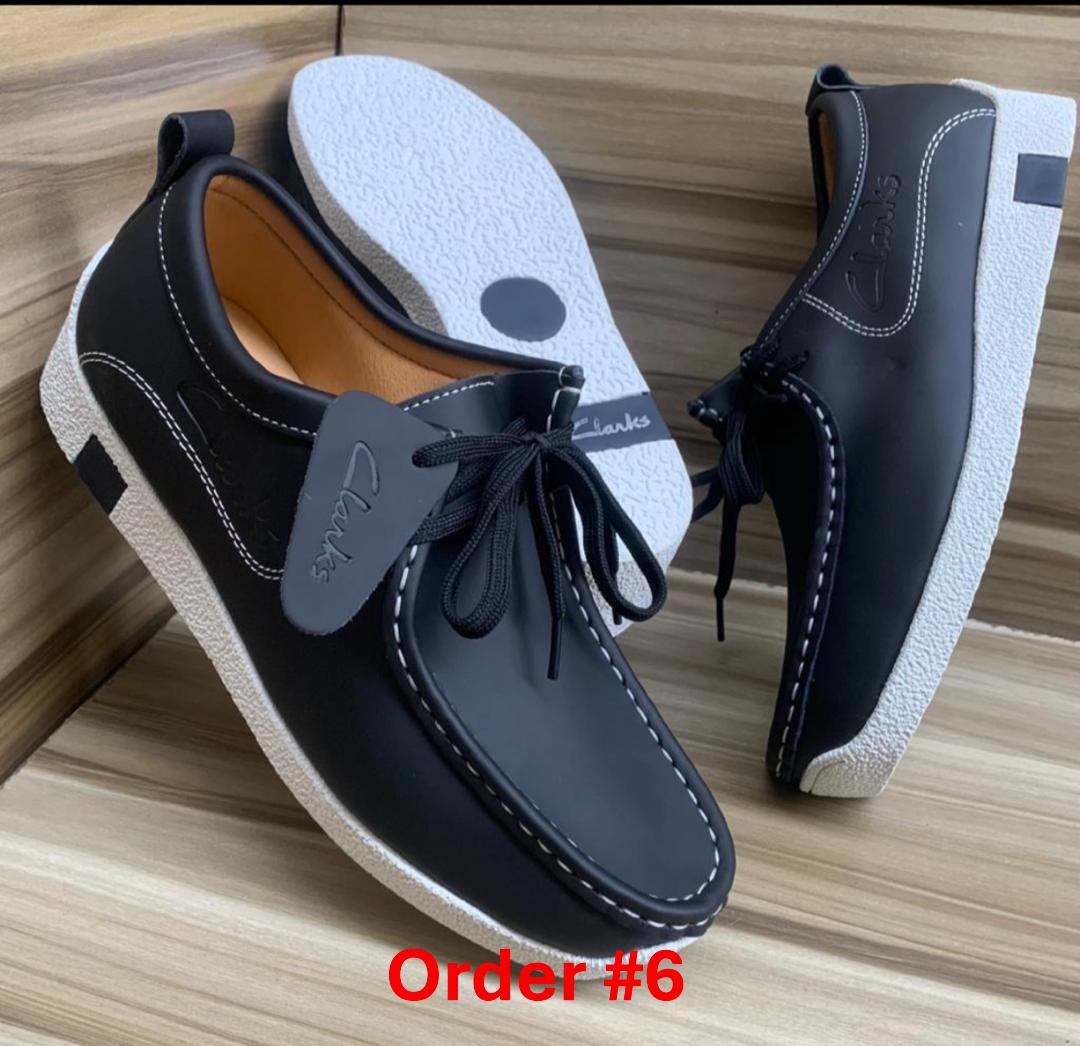 Blakck white sole Clarks walla