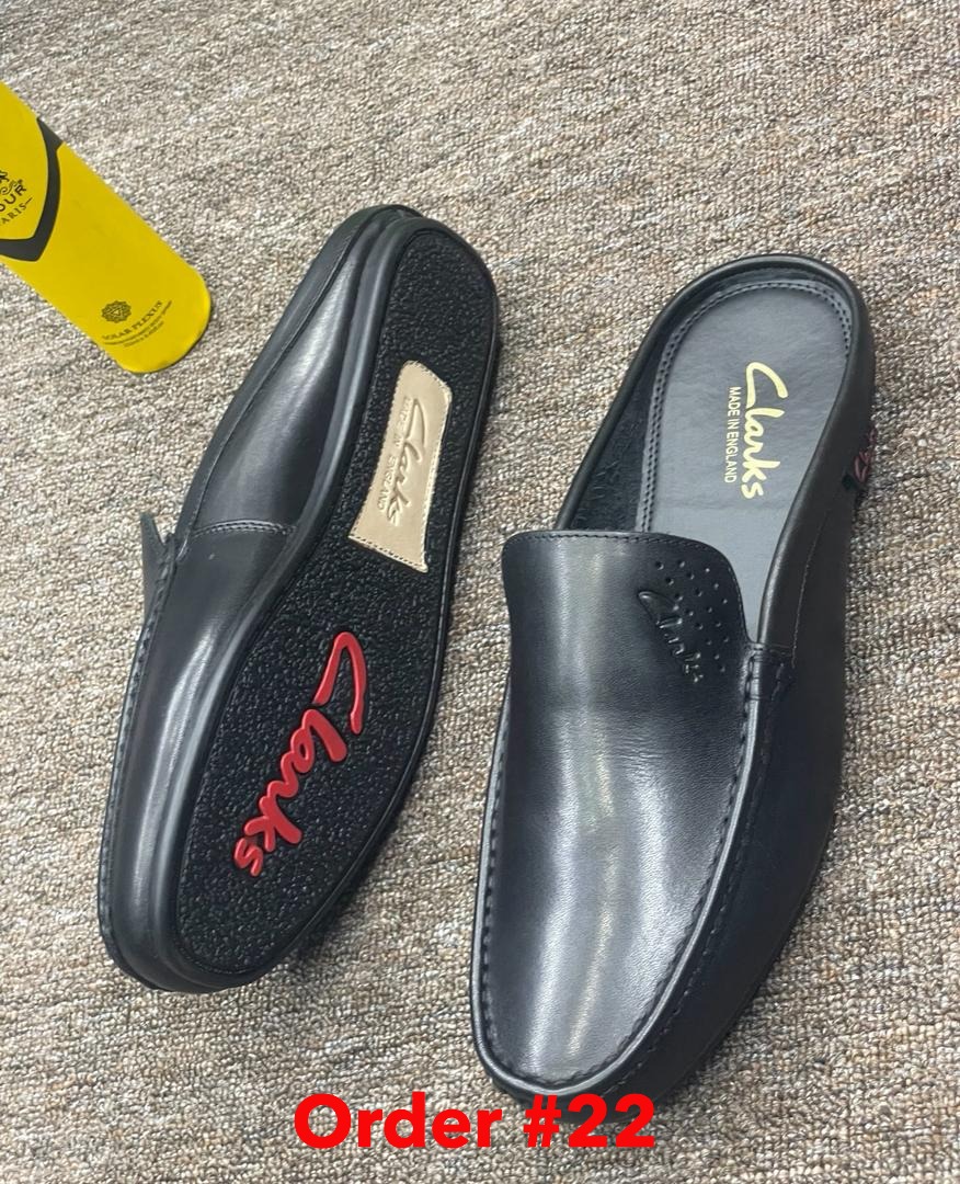 Plain black clarks half sole